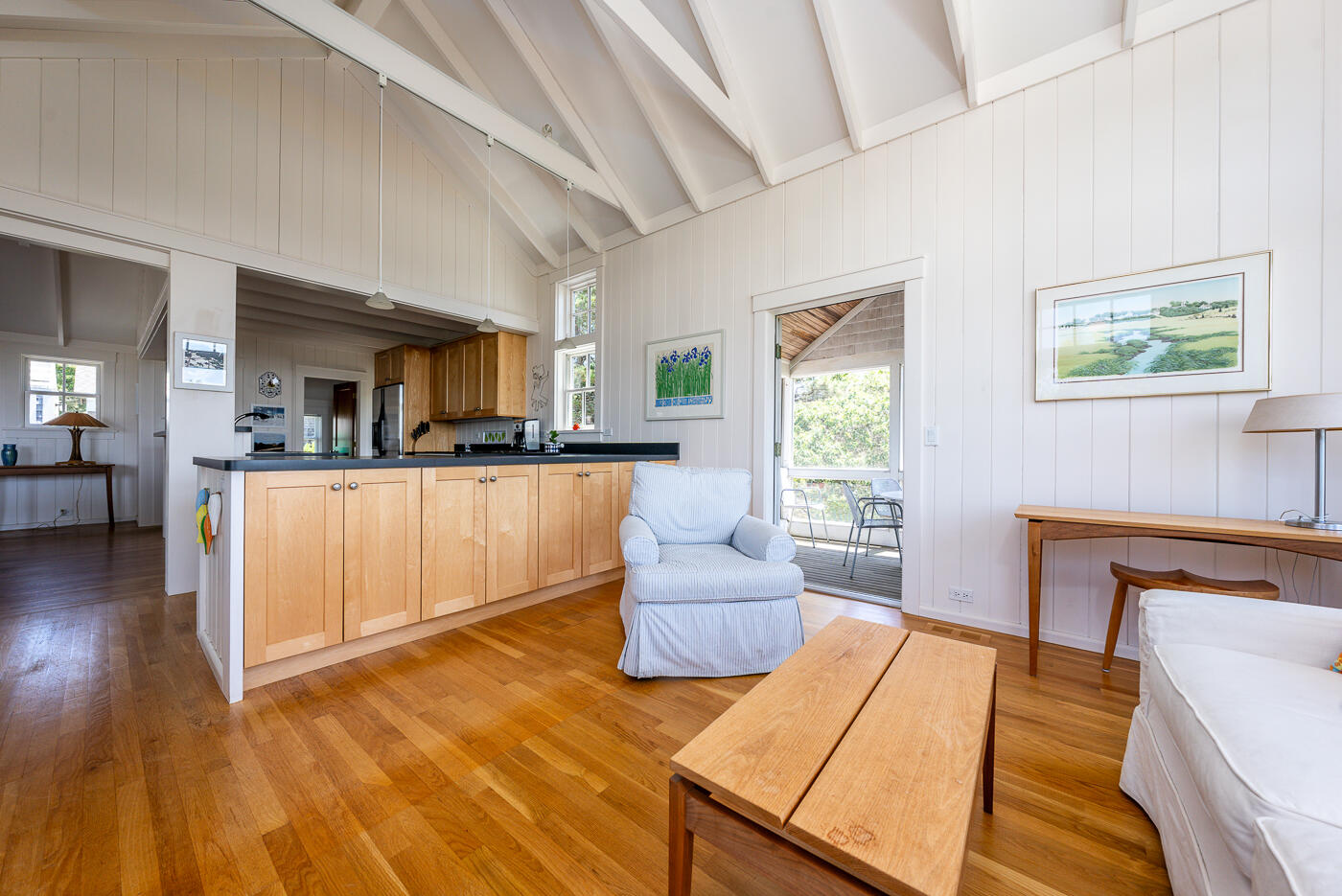 125 2nd Street Wellfleet, MA 02667 - Photo 25 of 75 a living room with furniture and a kitchen