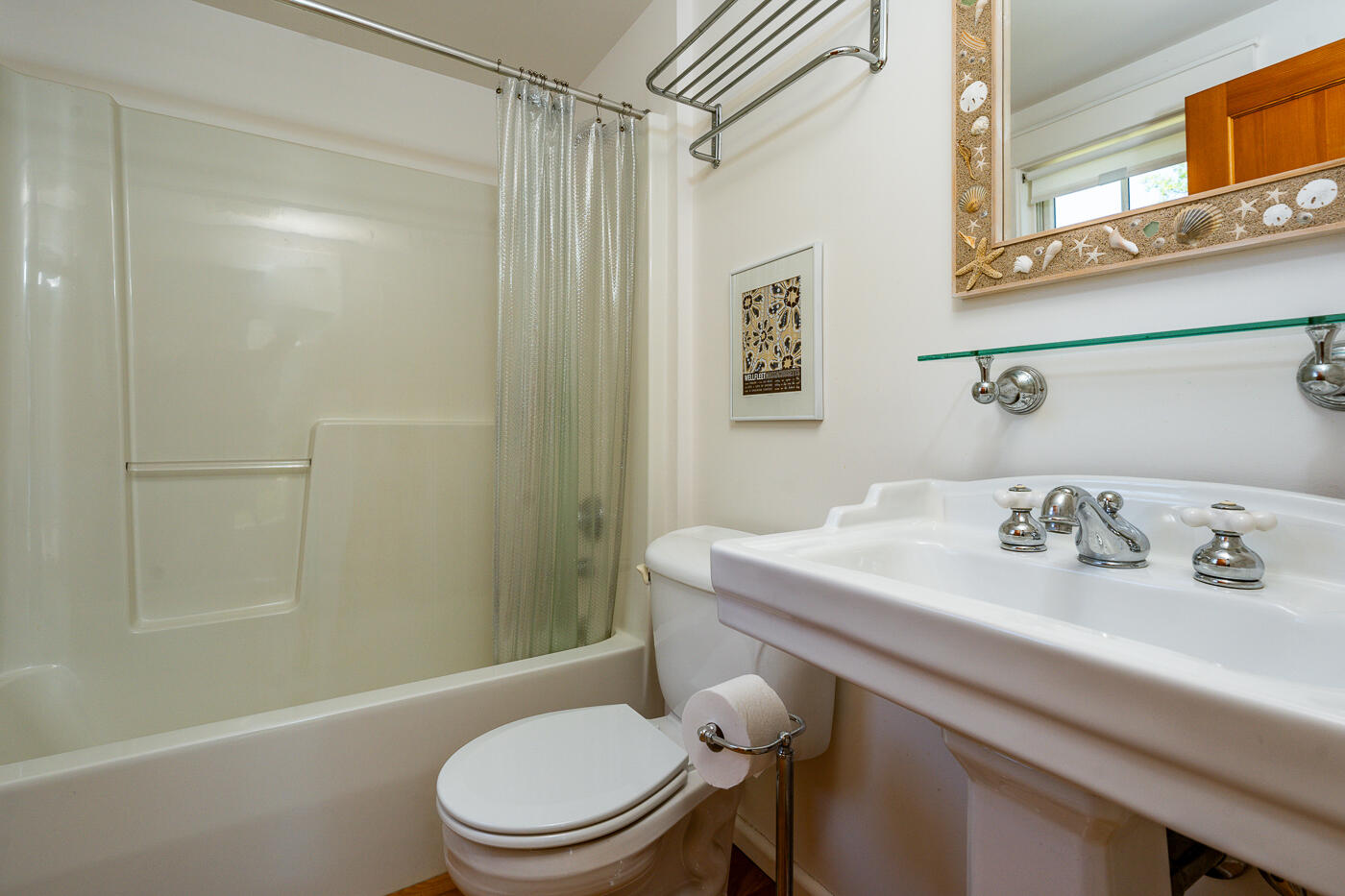 125 2nd Street Wellfleet, MA 02667 - Photo 39 of 75 a bathroom with a sink a toilet and shower