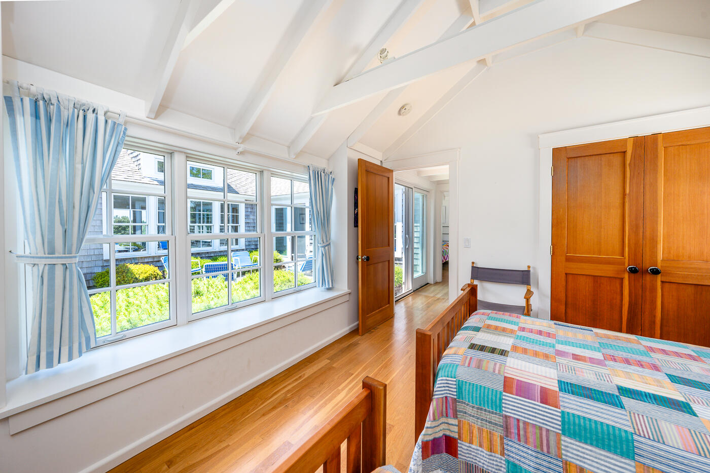 125 2nd Street Wellfleet, MA 02667 - Photo 41 of 75 a bedroom with furniture and large windows
