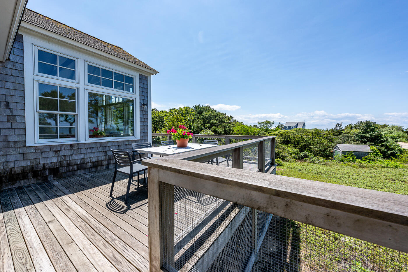 125 2nd Street Wellfleet, MA 02667 - Photo 55 of 75 a view of balcony with wooden floor and seating space