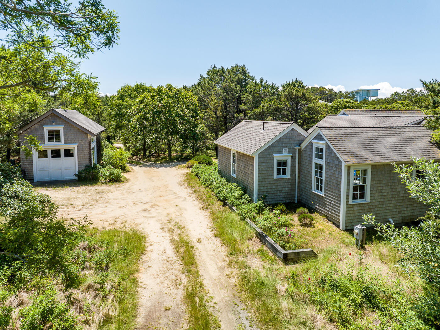 125 2nd Street Wellfleet, MA 02667 - Photo 65 of 75 a front view of a house with a yard