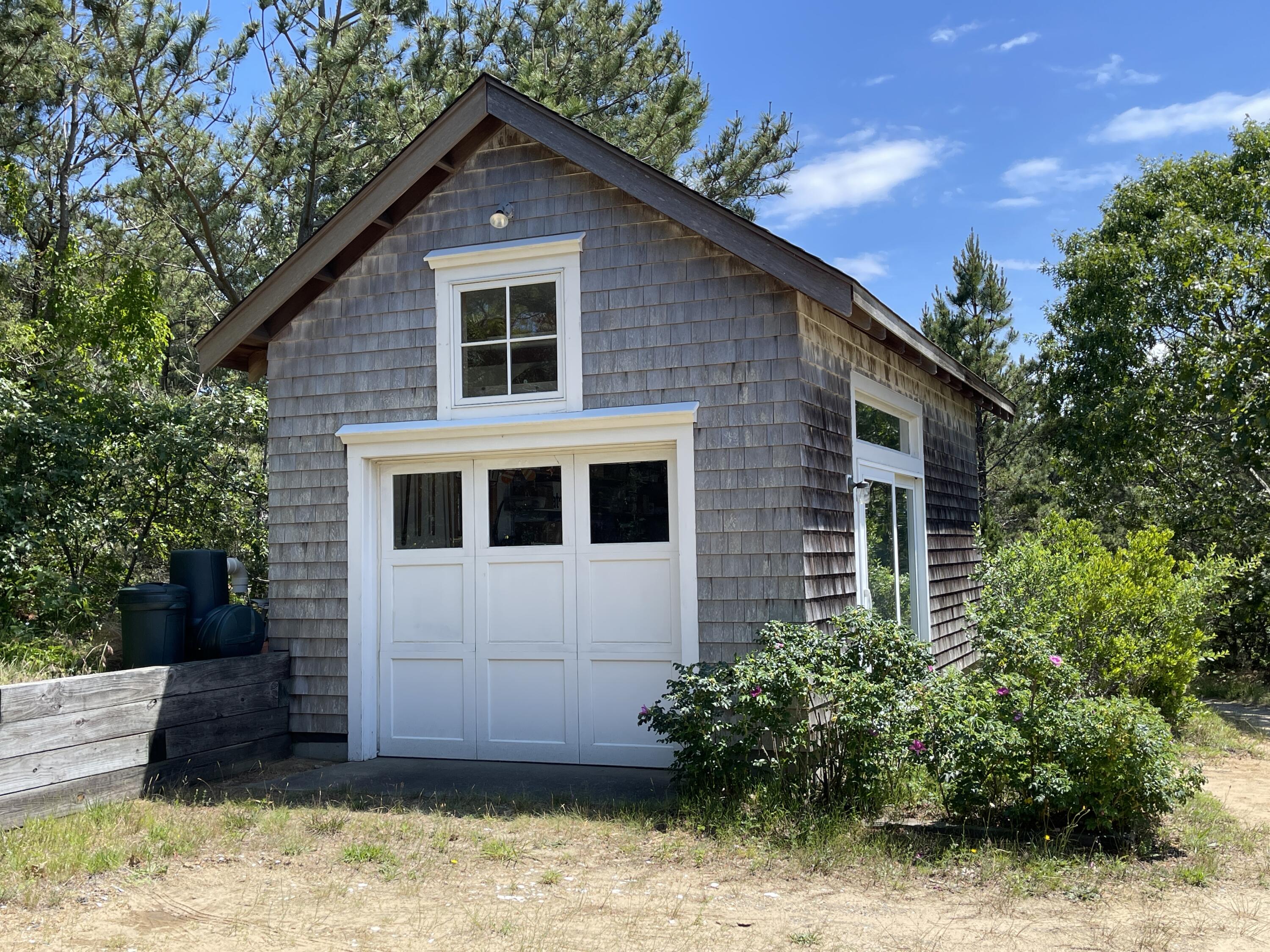 125 2nd Street Wellfleet, MA 02667 - Photo 66 of 75 a front view of a house with a yard