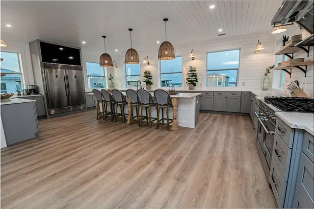 a bedroom with double bed and a window