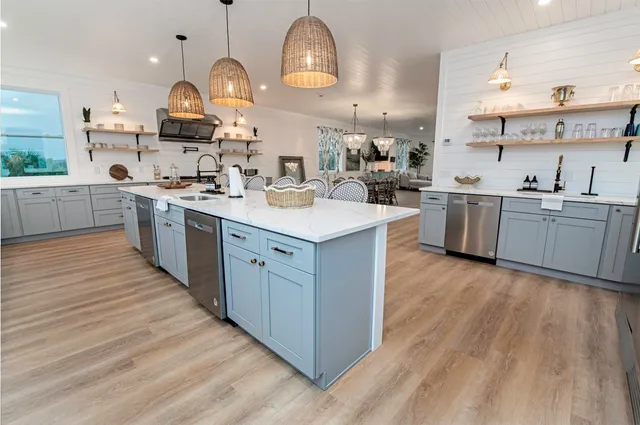 a bedroom with two beds and a window