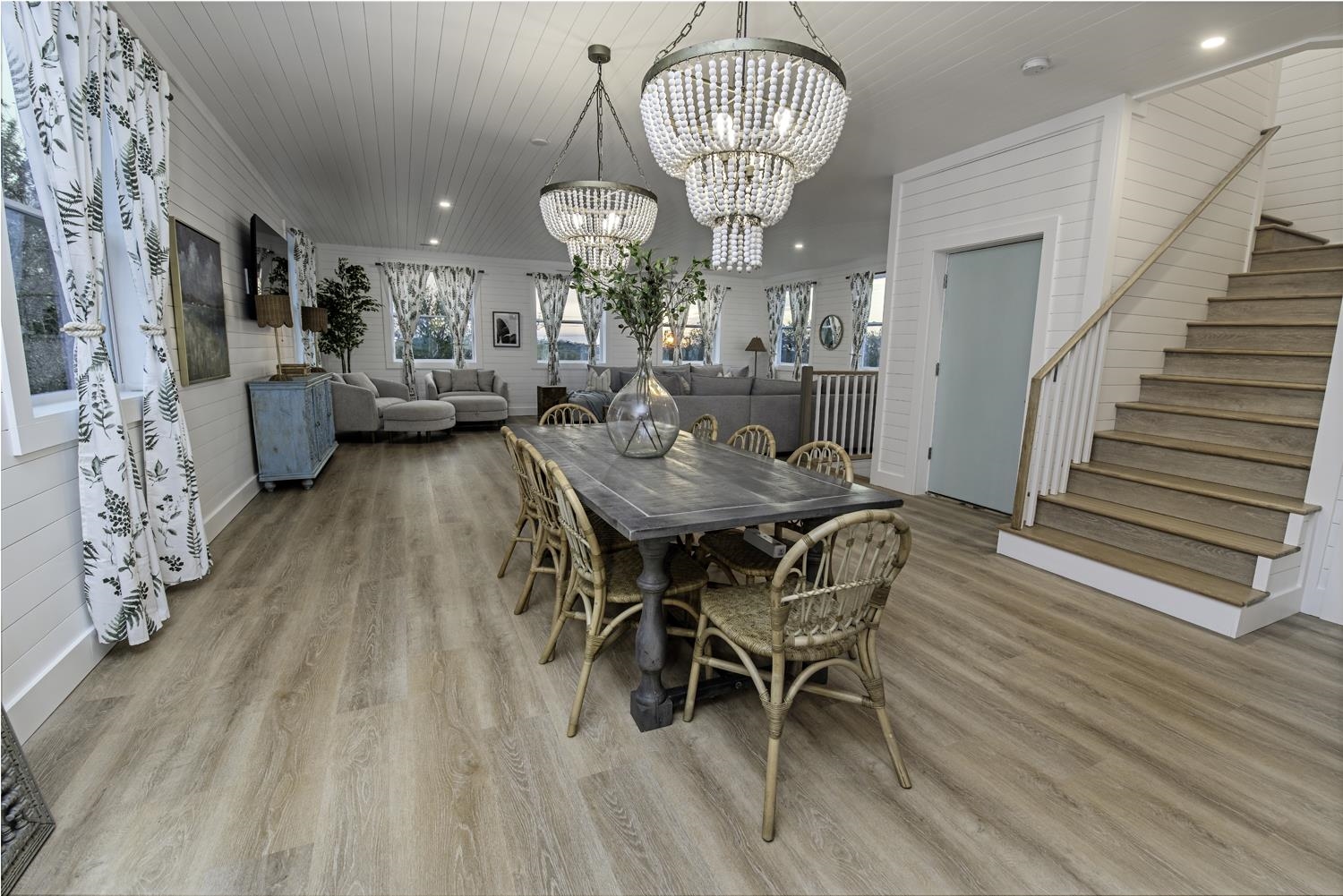 18 Inlet Place St. Augustine, FL 32080 - Photo 15 of 89 a view of a dining room with furniture wooden floor and chandelier