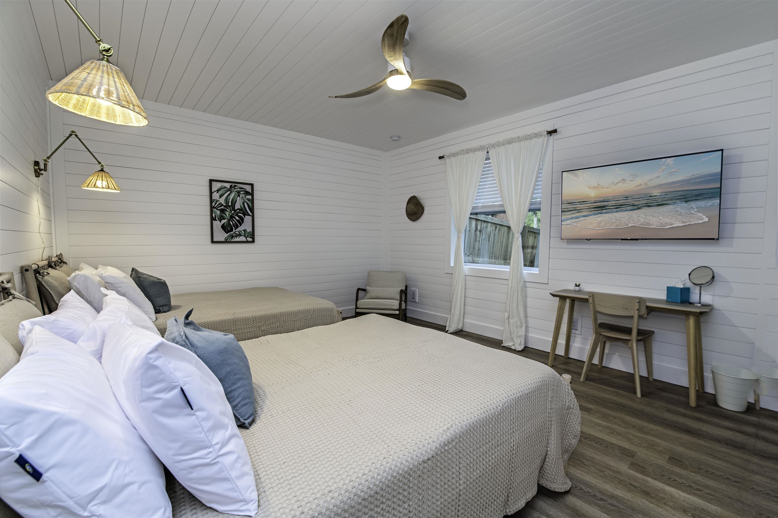 18 Inlet Place St. Augustine, FL 32080 - Photo 18 of 89 a bedroom with a bed and a chandelier