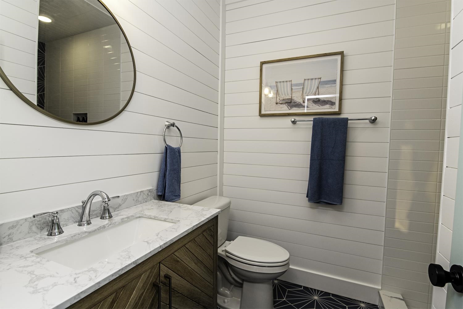 18 Inlet Place St. Augustine, FL 32080 - Photo 25 of 89 a bathroom with a sink and a mirror