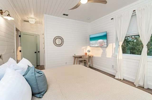 a kitchen with stainless steel appliances granite countertop a refrigerator a oven and a sink