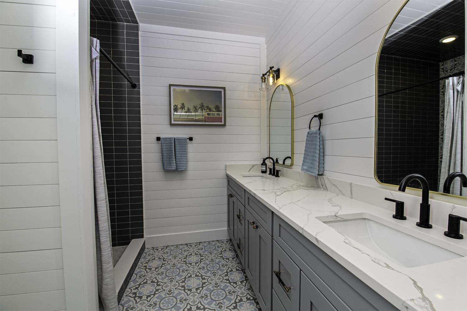 18 Inlet Place St. Augustine, FL 32080 - Photo 30 of 89 a bathroom with a sink and a mirror