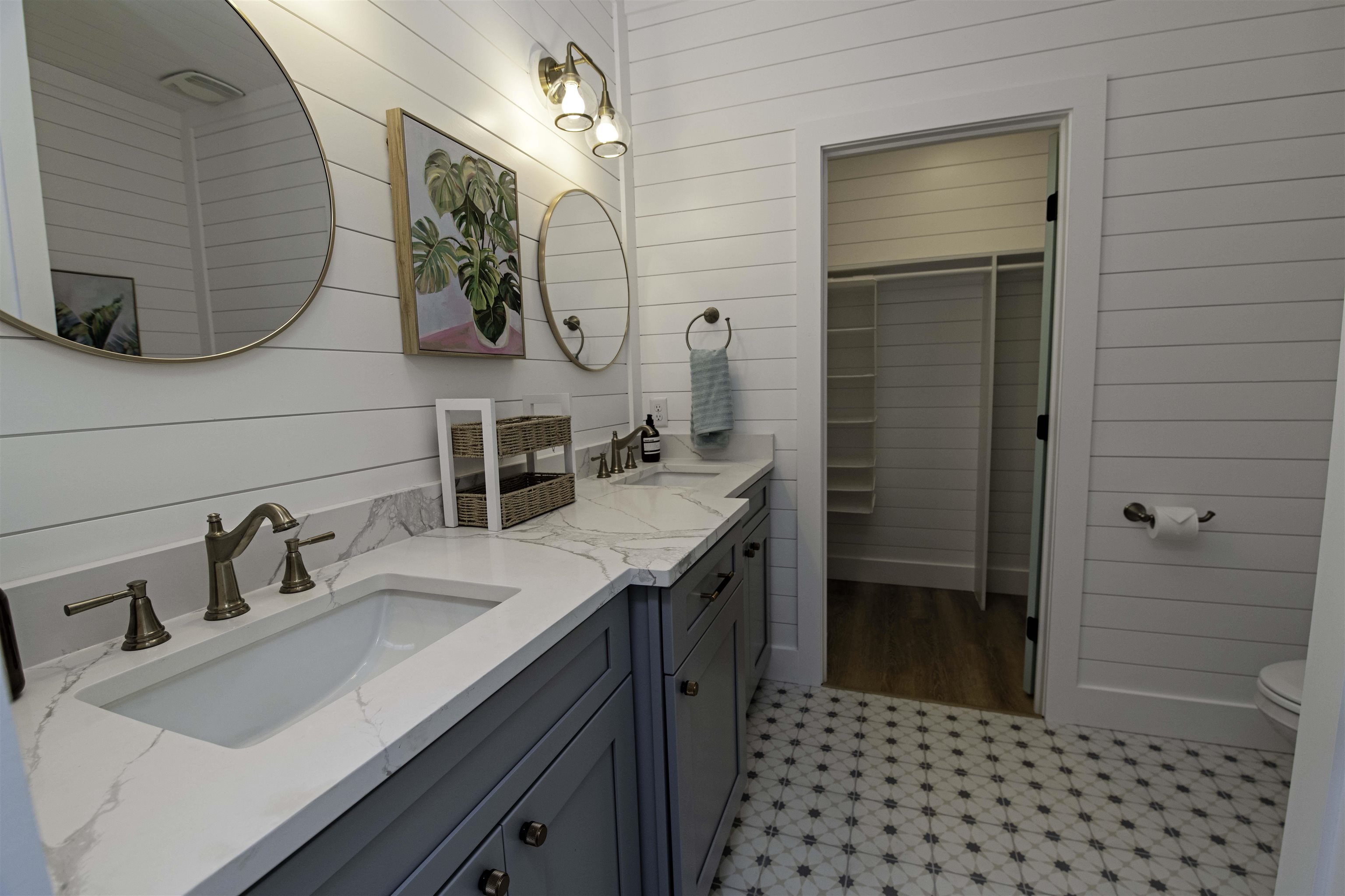 18 Inlet Place St. Augustine, FL 32080 - Photo 34 of 89 a bathroom with a sink and a mirror