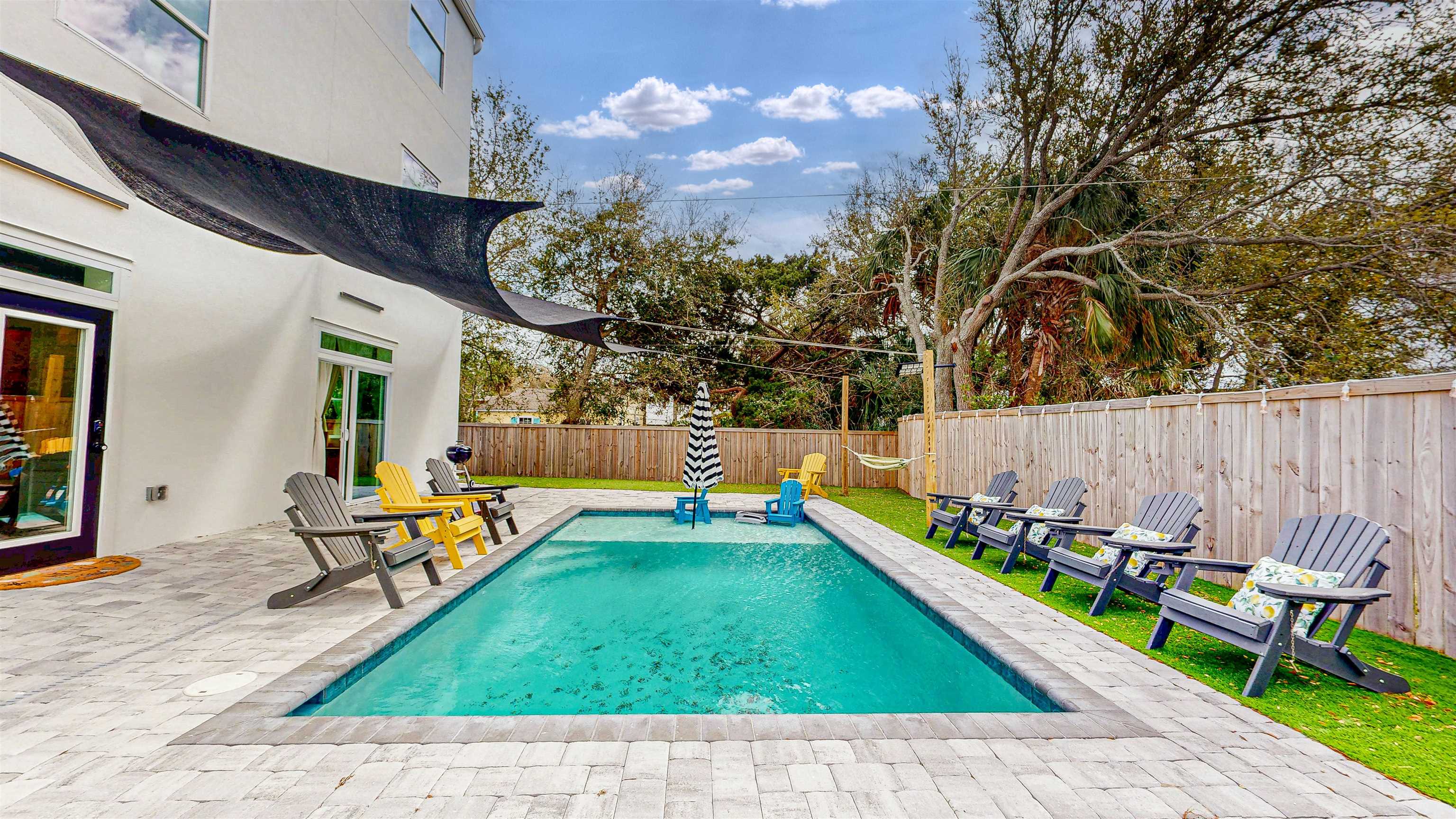 18 Inlet Place St. Augustine, FL 32080 - Photo 41 of 89 a view of swimming pool with a lounge chairs