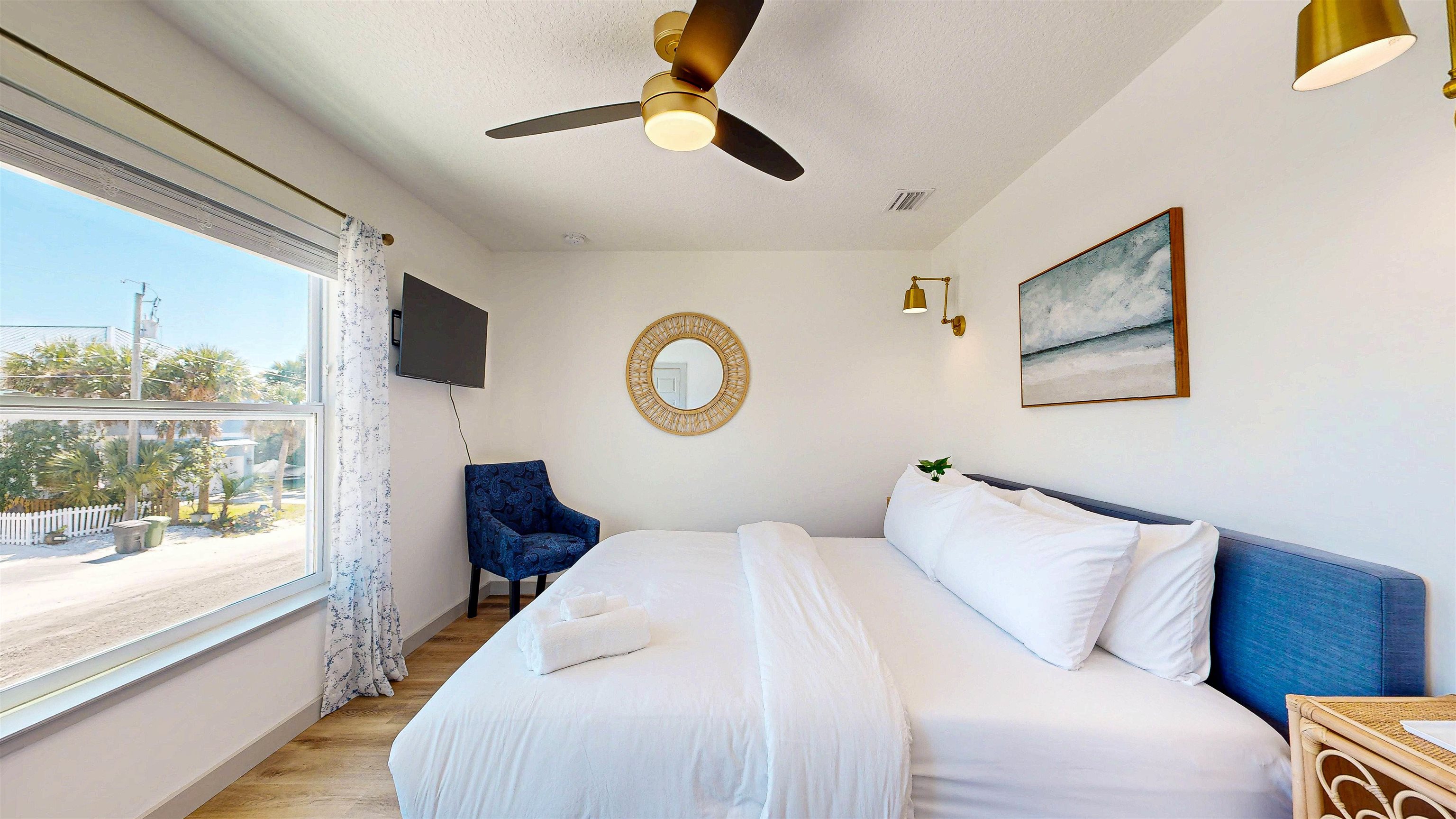 18 Inlet Place St. Augustine, FL 32080 - Photo 67 of 89 a bedroom with a large bed and a large window