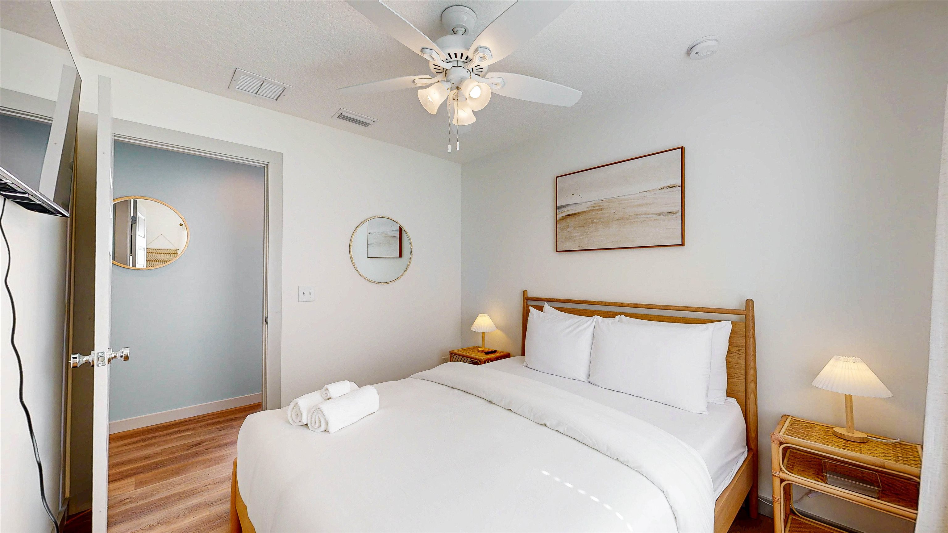 18 Inlet Place St. Augustine, FL 32080 - Photo 70 of 89 a bedroom with a bed and a chandelier