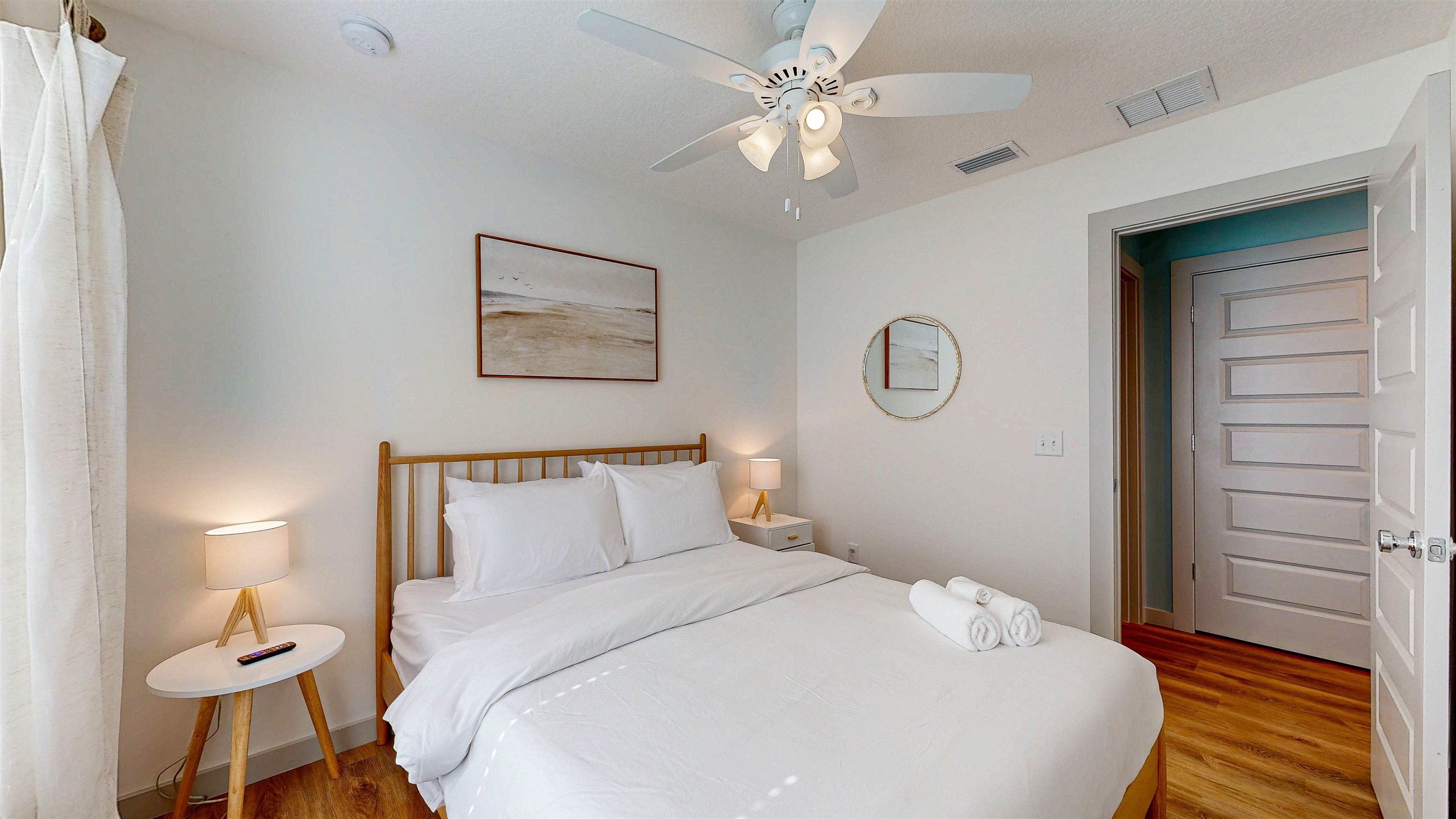 18 Inlet Place St. Augustine, FL 32080 - Photo 74 of 89 a bedroom with a bed and a chandelier