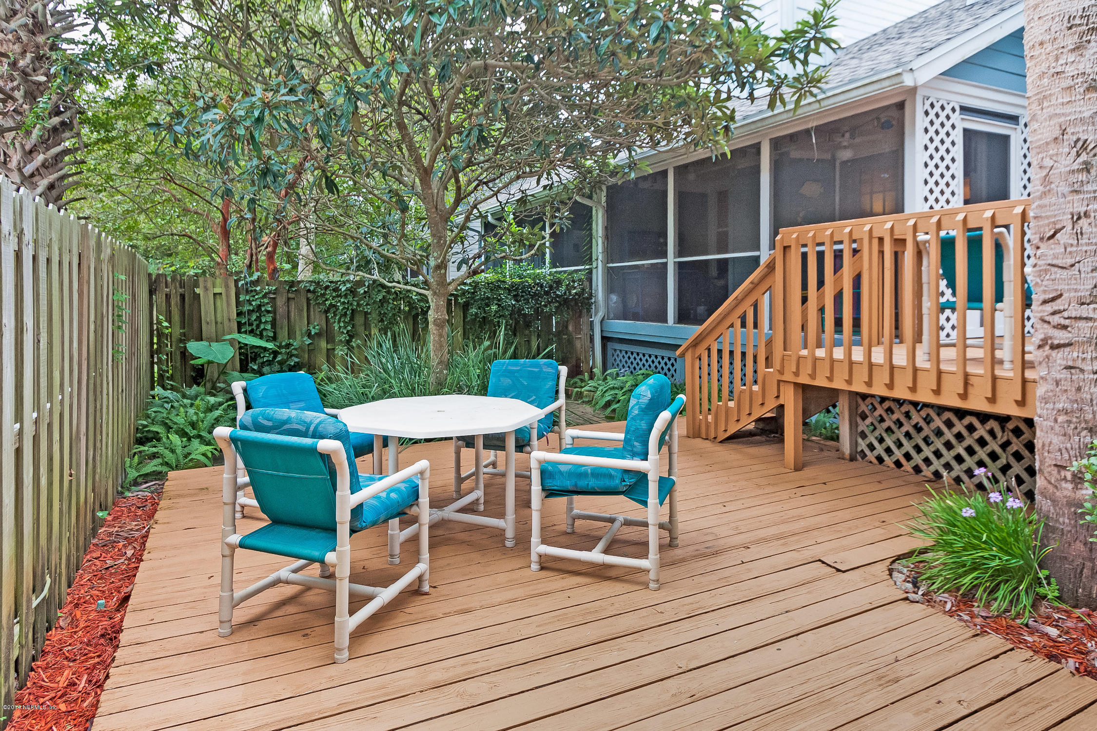 1969 Seminole Road Atlantic Beach, FL 32233 - Photo 29 of 36 a view of a deck with furniture and a yard