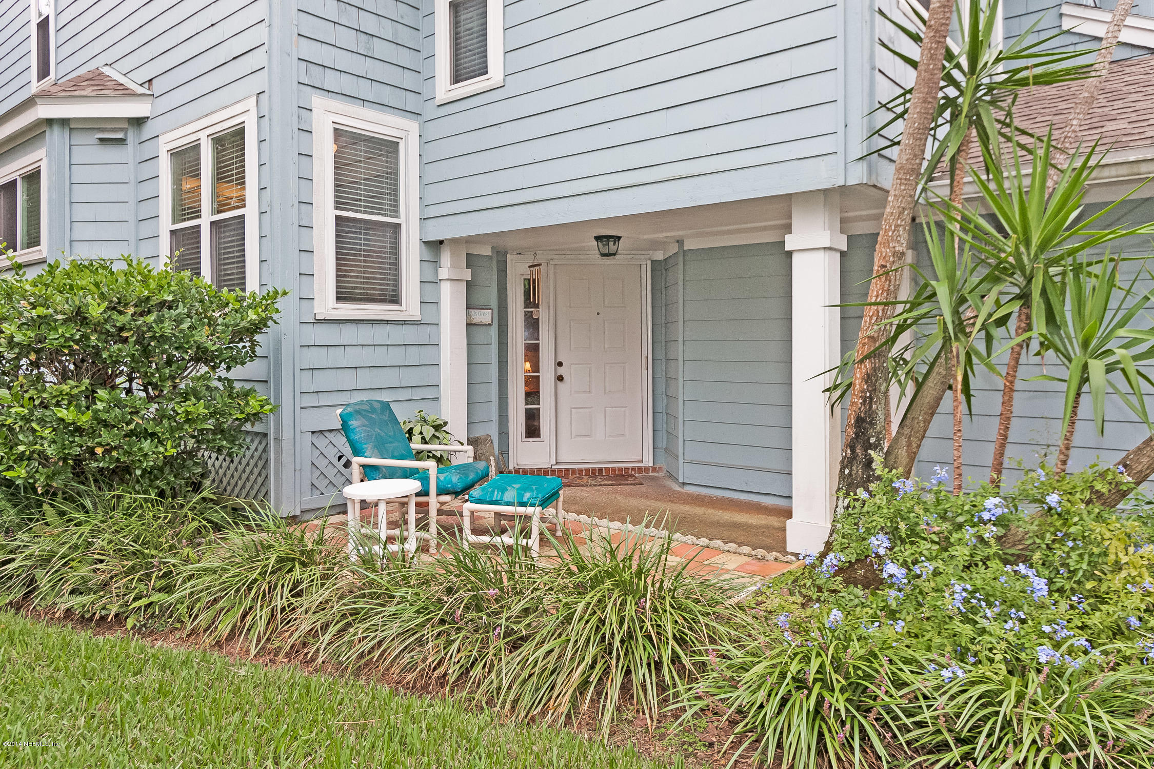 1969 Seminole Road Atlantic Beach, FL 32233 - Photo 3 of 36 a front view of a house with a yard