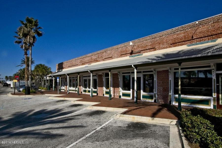1969 Seminole Road Atlantic Beach, FL 32233 - Photo 34 of 36 a front view of a building with garden