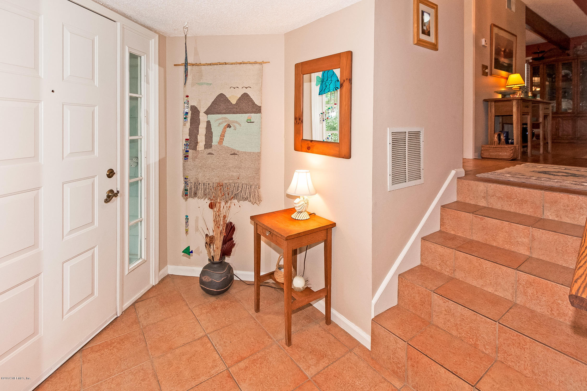 1969 Seminole Road Atlantic Beach, FL 32233 - Photo 4 of 36 a view of entryway and hall with dining room