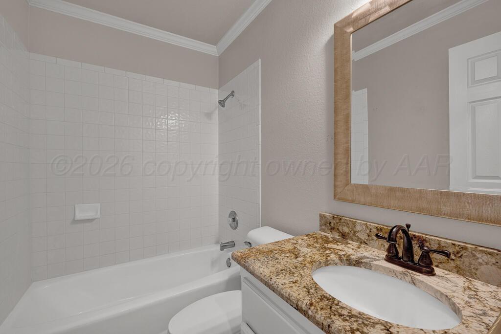 19933 Indian Spring Trail Bushland, TX 79124 - Photo 25 of 32 a bathroom with a granite countertop sink toilet and shower