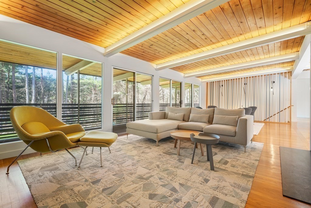 53 Beaver Road Weston, MA 02493 - Photo 12 of 38 a living room with furniture and a large window