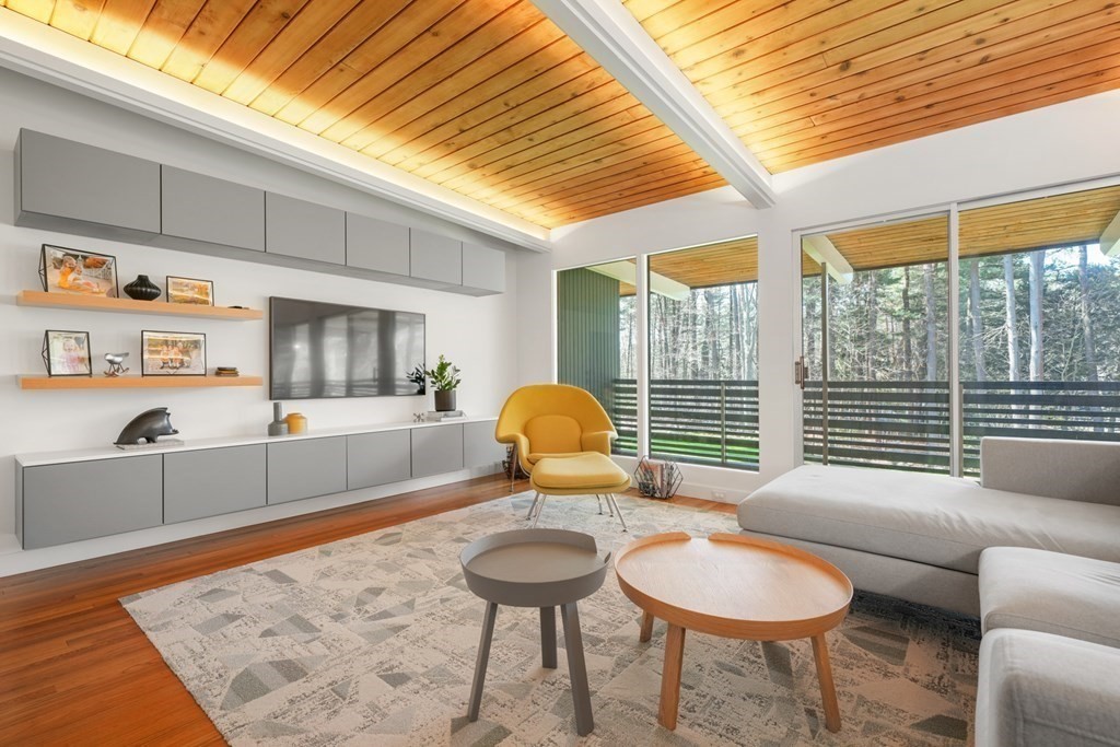 53 Beaver Road Weston, MA 02493 - Photo 14 of 38 a living room with furniture and a table