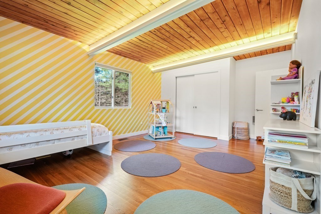 53 Beaver Road Weston, MA 02493 - Photo 22 of 38 a living room with furniture and wooden floor