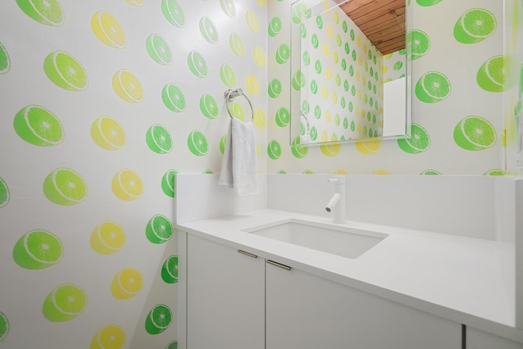 53 Beaver Road Weston, MA 02493 - Photo 23 of 38 a bathroom with a sink and mirror with a sink