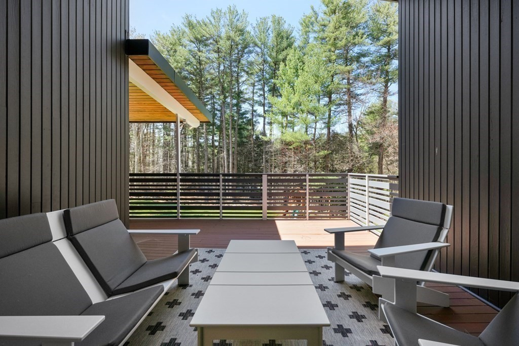 53 Beaver Road Weston, MA 02493 - Photo 25 of 38 a view of deck with chairs and wooden fence