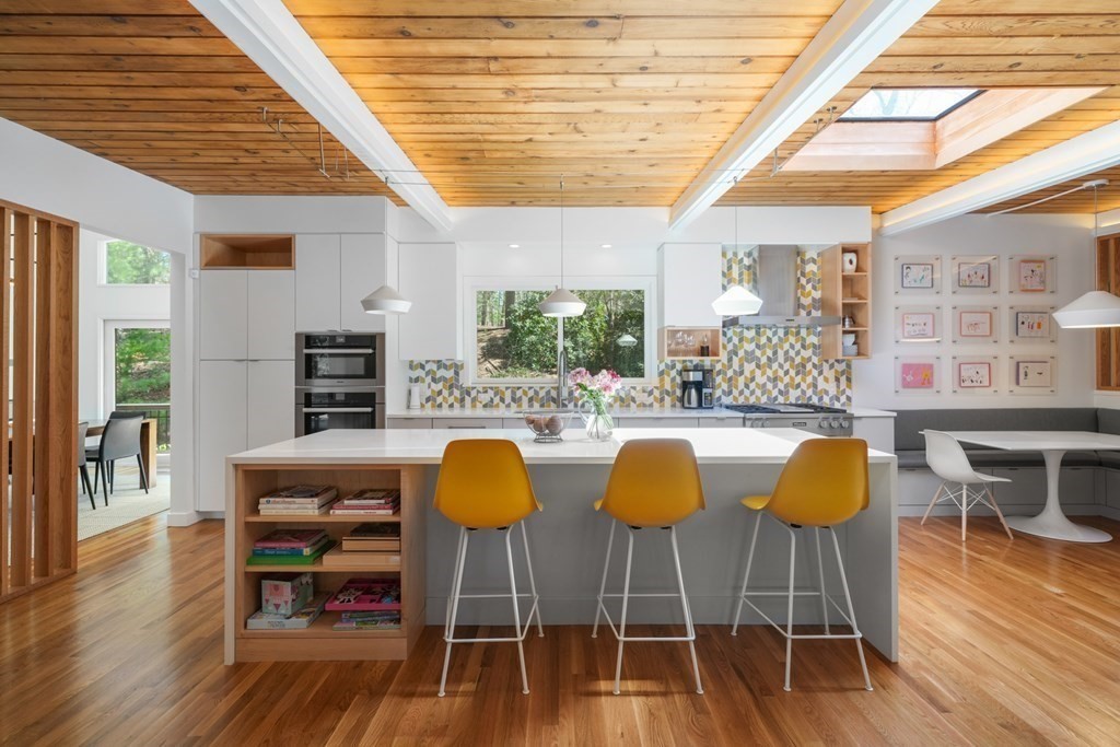 53 Beaver Road Weston, MA 02493 - Photo 5 of 38 a view of a dining room with furniture and wooden floor