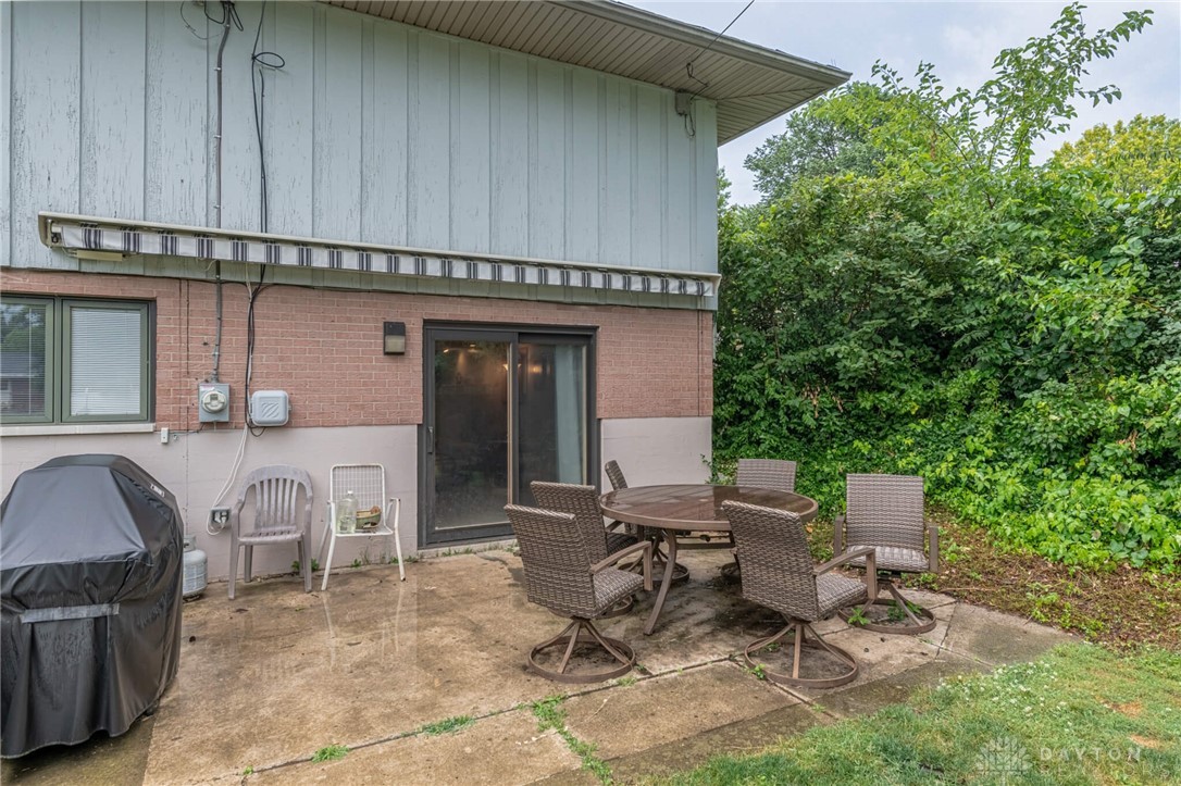 5603 Oak Valley Road Dayton, OH 45440 - Photo 21 of 22 Patio with Sunsetter awning