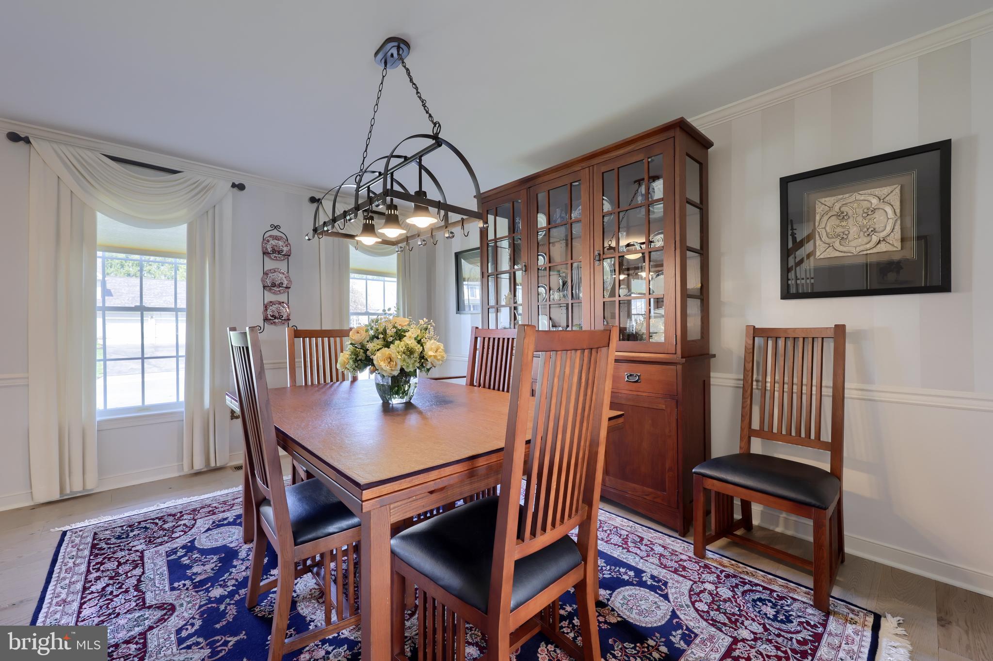 362 Squire Lane Lititz, PA 17543 - Photo 15 of 49 a view of a dining room with furniture window and wooden floor