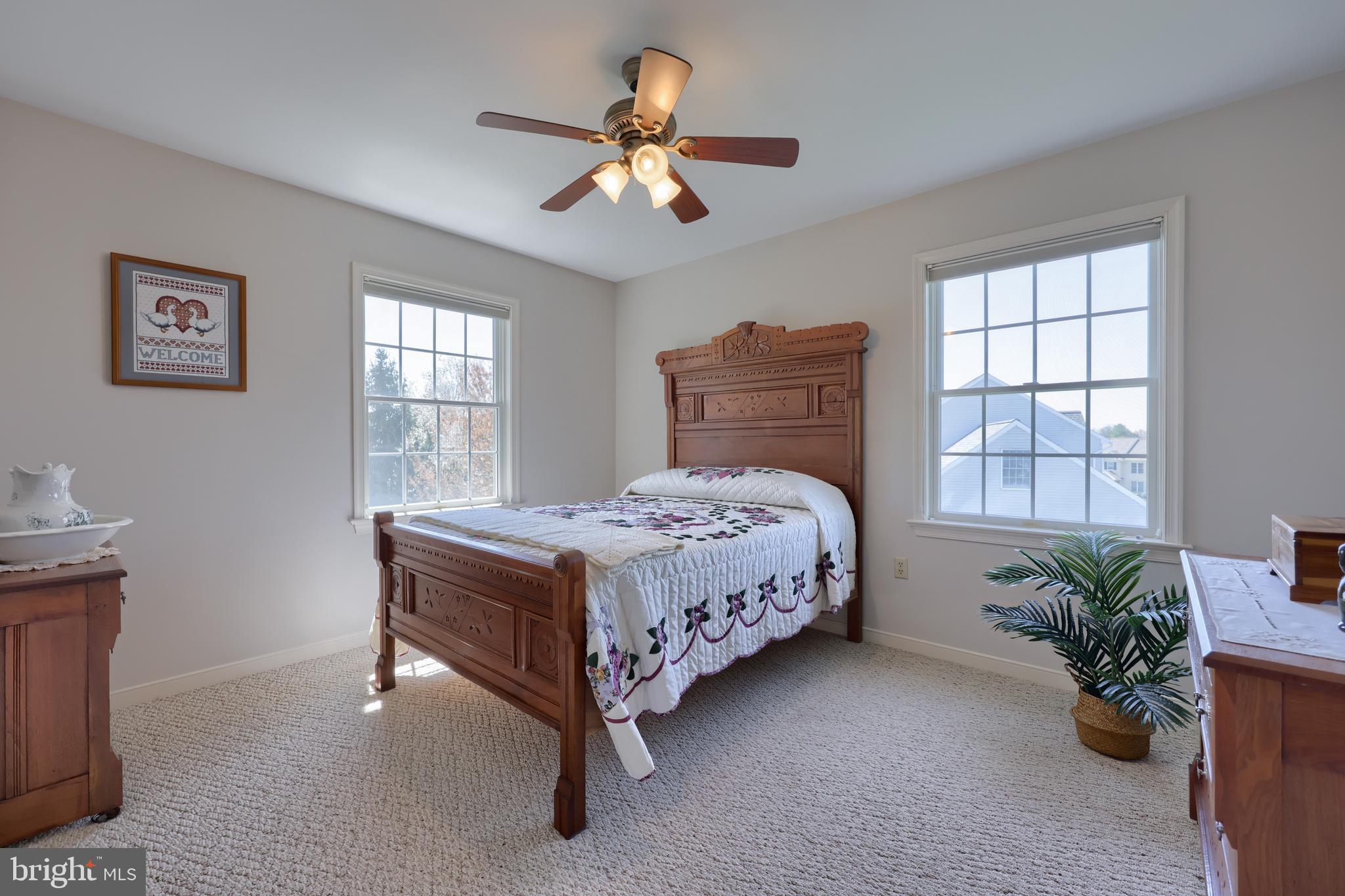 362 Squire Lane Lititz, PA 17543 - Photo 27 of 49 a bed sitting in a bedroom next to a window