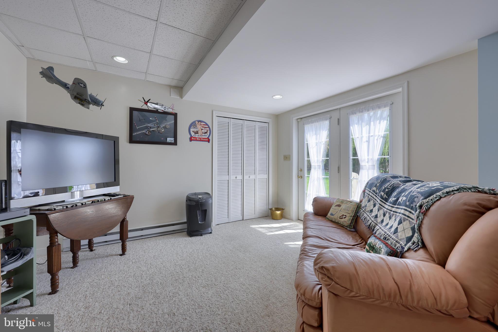 362 Squire Lane Lititz, PA 17543 - Photo 36 of 49 a living room with furniture and a flat screen tv