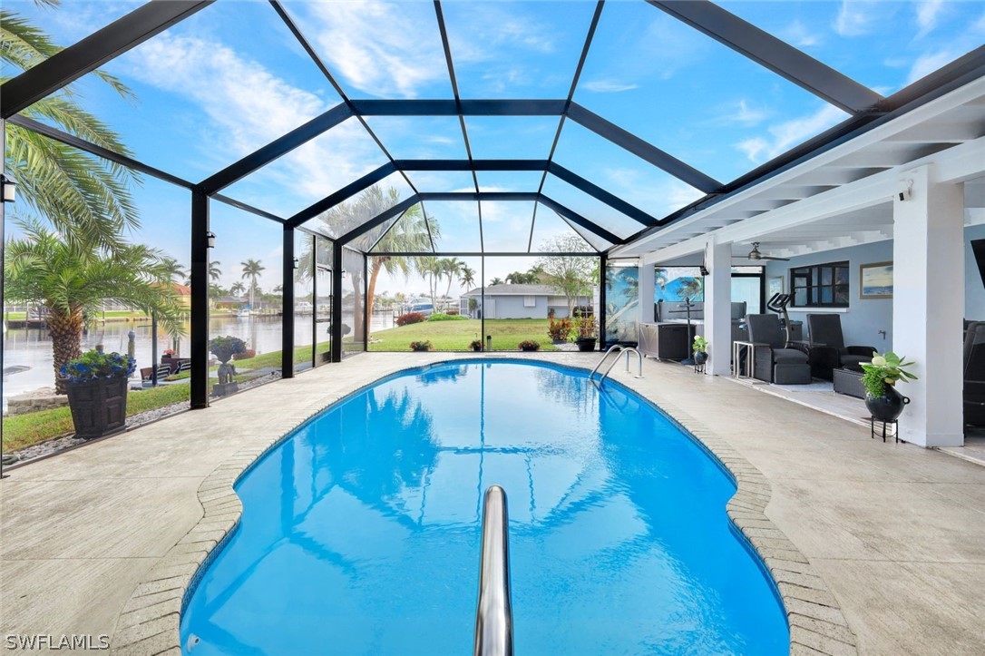 a view of a swimming pool with a porch