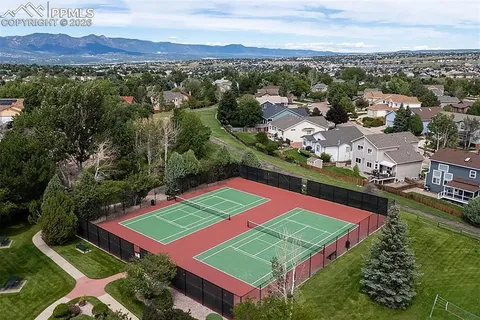an aerial view of a pool patio patio and outdoor seating