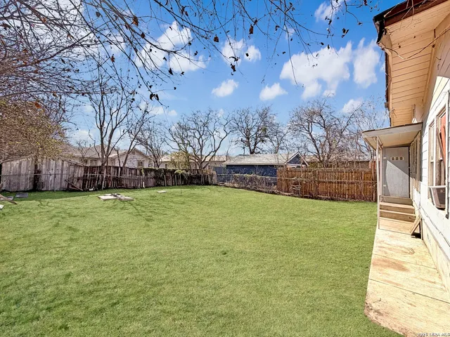a front view of house with yard and seating area