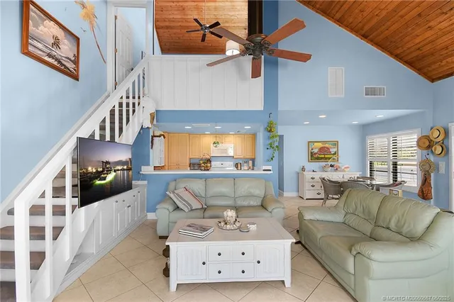 a bed room with a bed and a large window