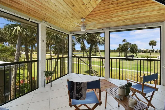 a balcony with furniture