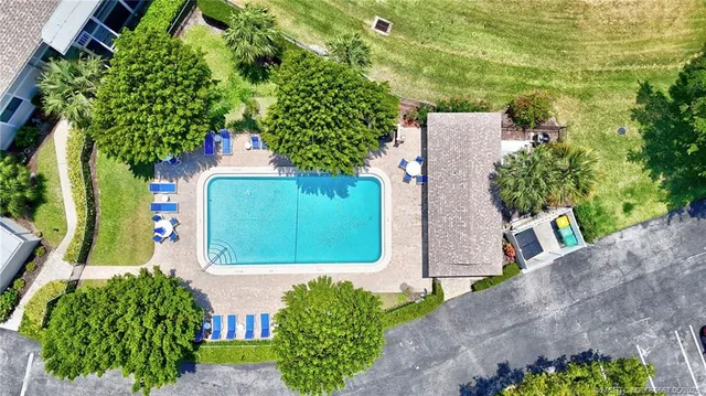 a view of a playground with basketball court