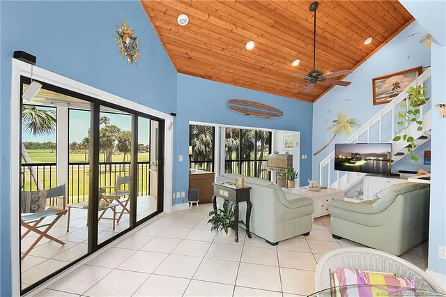 a kitchen with stainless steel appliances granite countertop a stove and cabinets