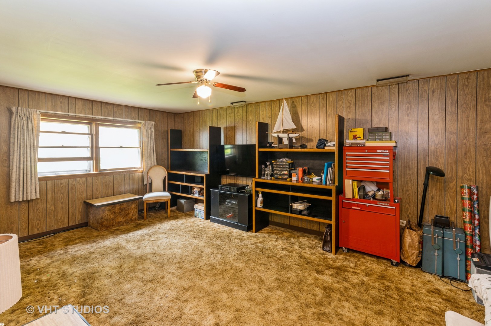 1232 Elder Road Homewood, IL 60430 - Photo 10 of 10 a living room with furniture and a flat screen tv