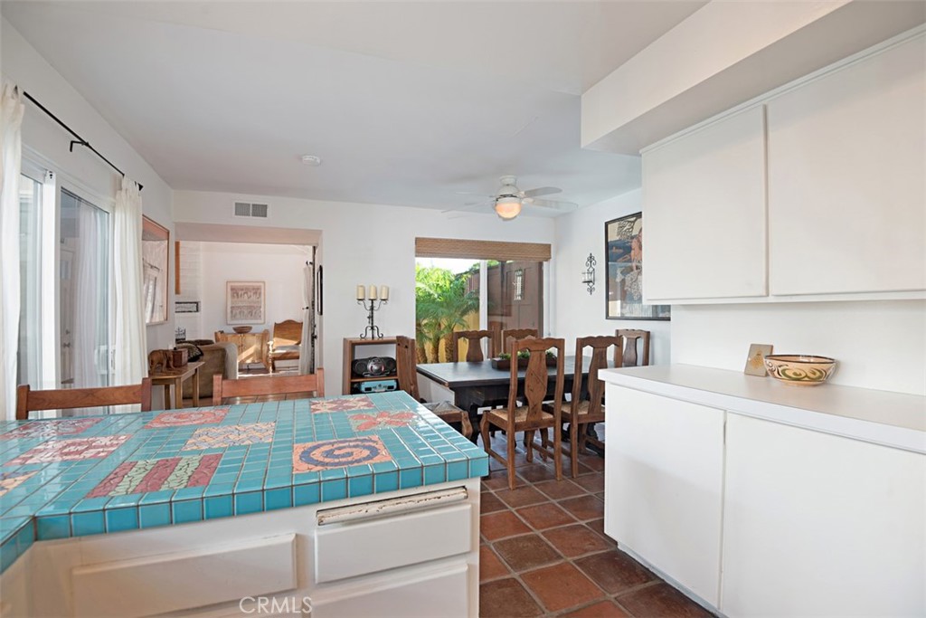23761 Timor Bay Dana Point, CA 92629 - Photo 19 of 45 a living room with furniture a dining table and next to a window