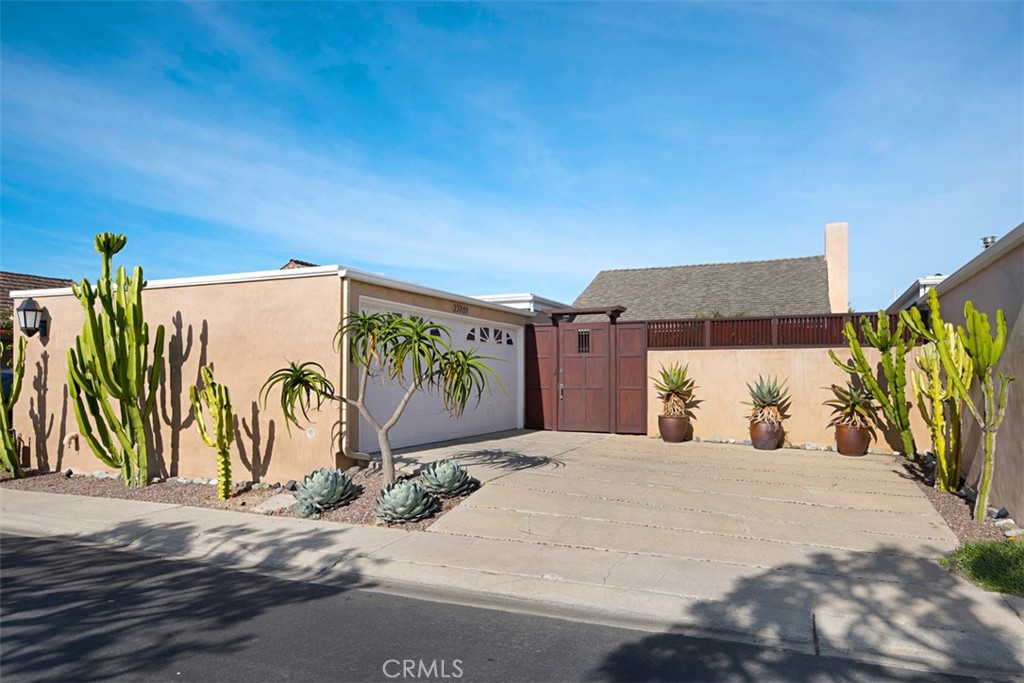 23761 Timor Bay Dana Point, CA 92629 - Photo 2 of 45 a bedroom with a bed and a table