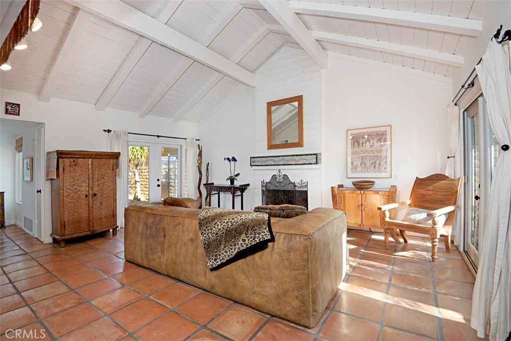 23761 Timor Bay Dana Point, CA 92629 - Photo 8 of 45 a living room with furniture and a fireplace