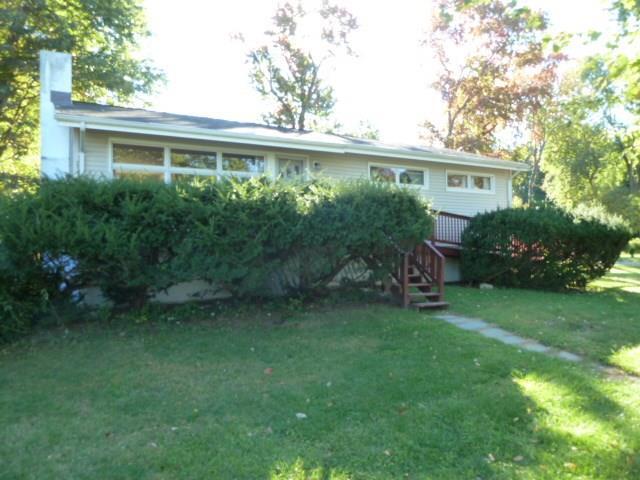 39 Saddle Road Norwalk, CT 06851 - Photo 1 of 1 a house view with a garden space