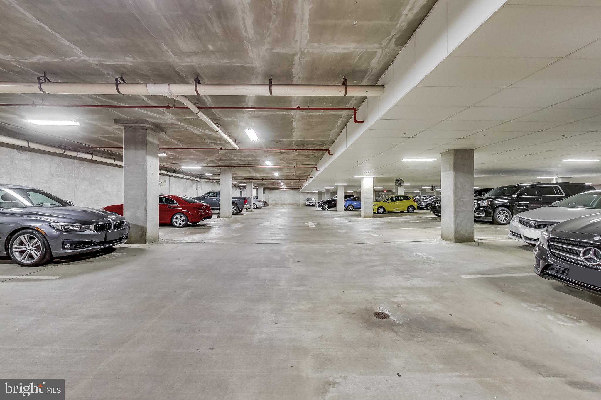 8045 Newell Street, Unit 118 Silver Spring, MD 20910 - Photo 38 of 39 a view of parking area with parked cars