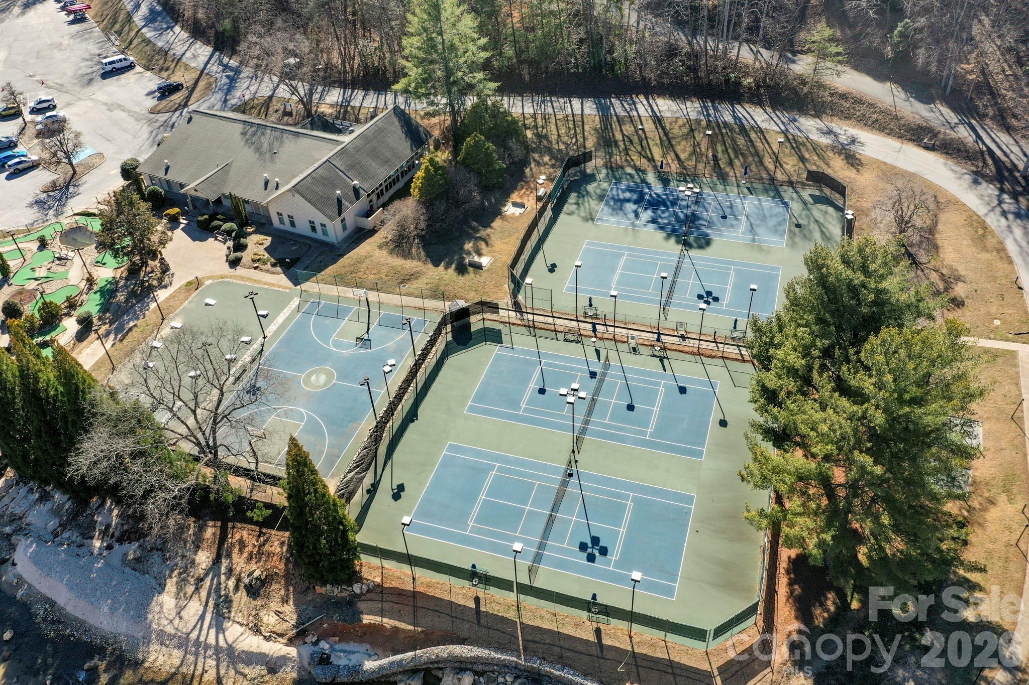 0 Buffalo Creek Road Lake Lure, NC 28746 - Photo 21 of 33 an aerial view of a residential apartment building with a yard