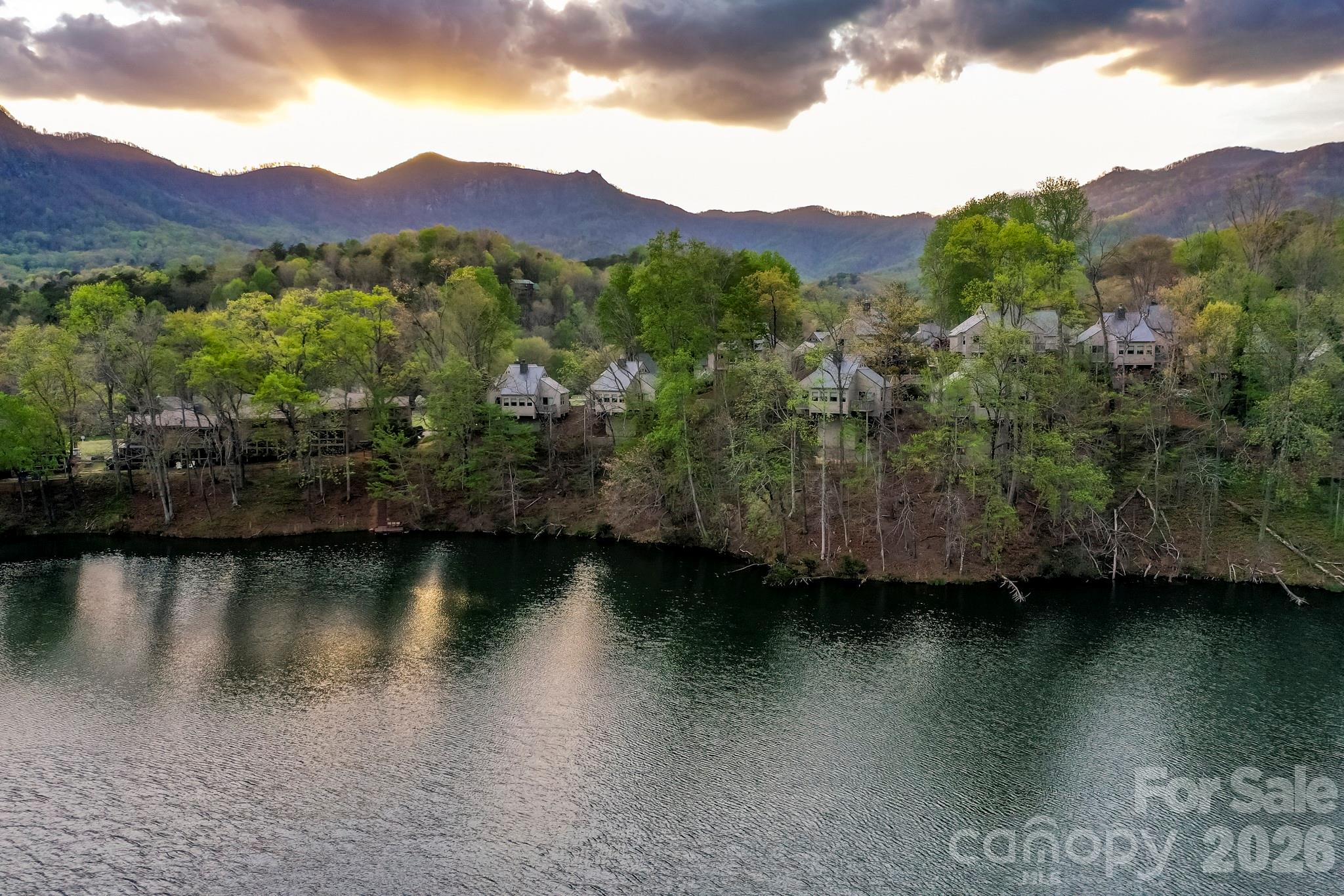 0 Buffalo Creek Road Lake Lure, NC 28746 - Photo 3 of 33 a view of a lake with a mountain
