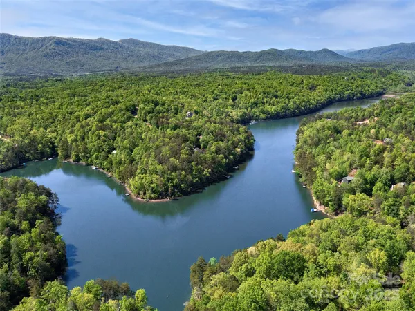 a view of lake with mountain in the background