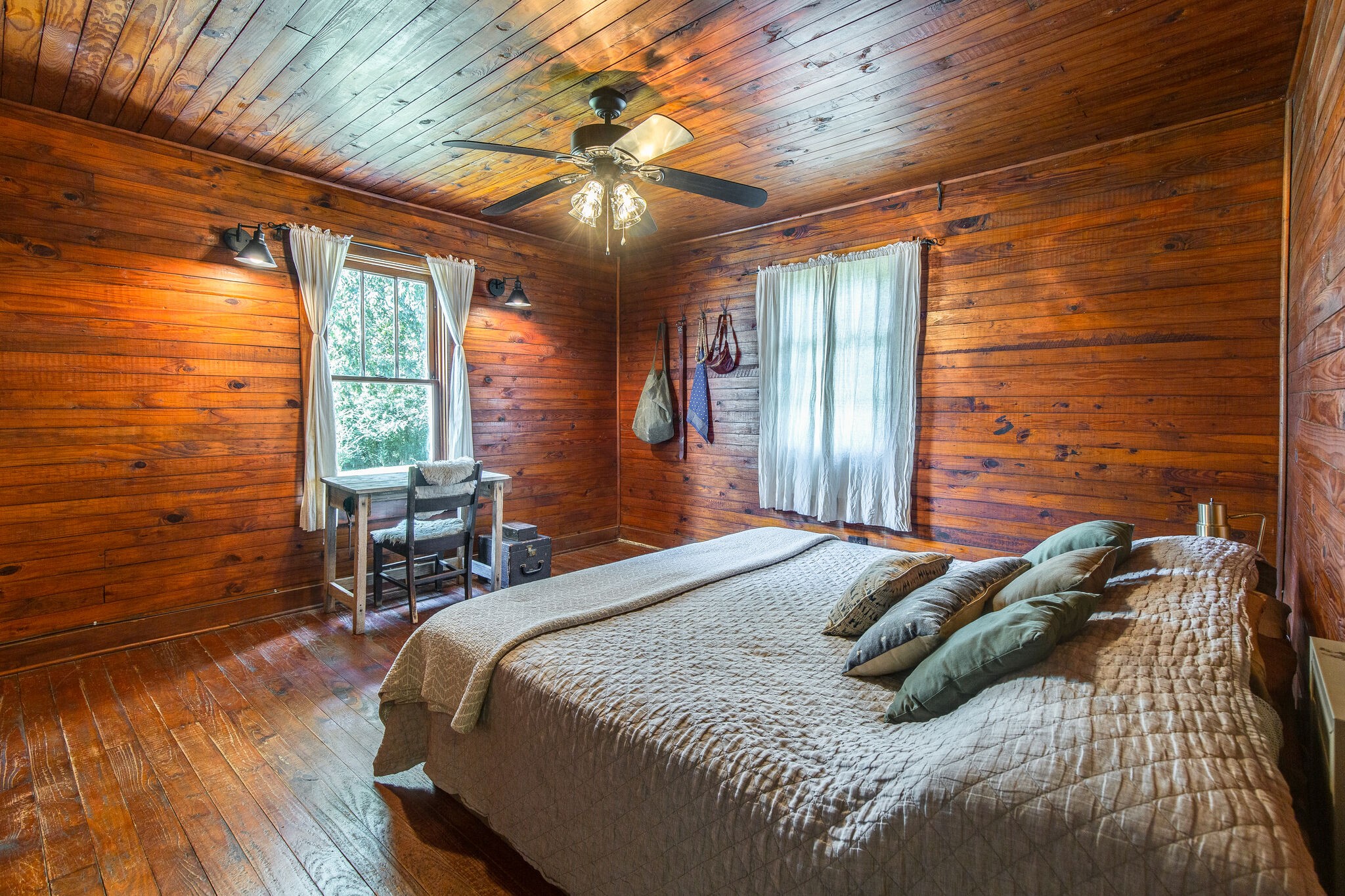 10221 Ed Lyell Road Lyles, TN 37098 - Photo 13 of 27 a bed sitting in a spacious bedroom next to a window
